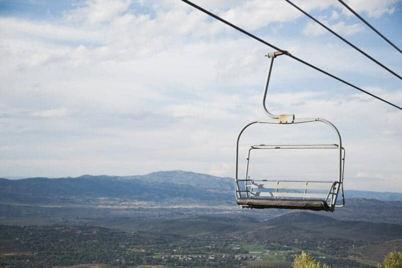 picture of a chairlift in the summer